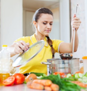 woman cooking  vegetarian food